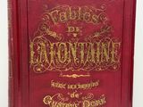 un livre rouge avec des lettres dorées sur la couverture