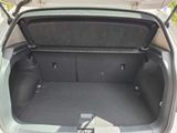 a trunk of a car with a seat folded down