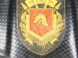 a close up of a helmet with a shield on it