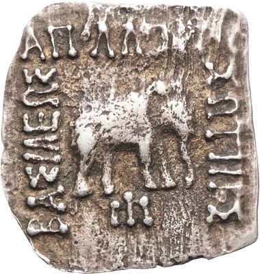 a close up of a silver coin with a horse on it