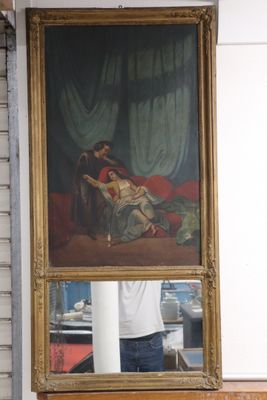 un homme en train de prendre une photo d'un tableau dans un miroir