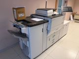 a photo of a printer sitting on top of a desk