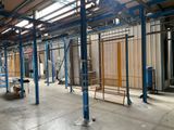 a room that has a lot of blue poles in it