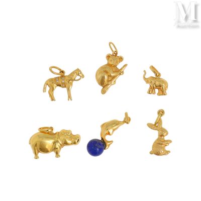 Lot de pendentifs Lot de pendentifs en or jaune 18K (750°/°°…