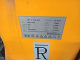 a yellow container with a sticker on it