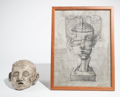 dessin représentant la tête d'un homme, à côté d'un dessin encadré représentant la tête d'un homme