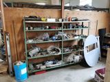 a garage with a lot of tools on the shelves