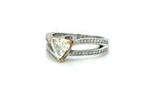 a close up of a diamond ring on a white background