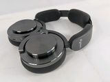an image of a pair of headphones sitting on top of a white surface