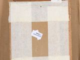 a picture of a box with a piece of paper on it