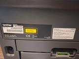 a close up of a printer on a table