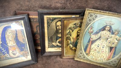 three framed pictures of the virgin and other religious religious items