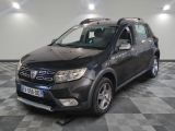 a picture of a black dacia parked on a checkered floor