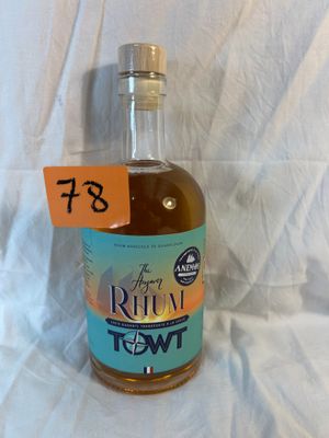 a bottle of liquor with a price tag on it