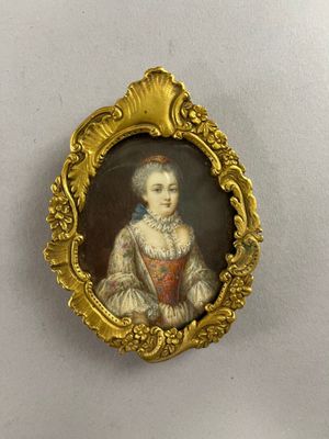 portrait of a woman in a red dress in a gold frame