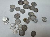 a lot of coins that are on the table