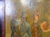 un tableau accroché au mur d'une pièce où se trouve un tableau représentant deux femmes