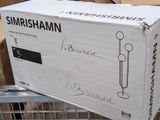 a box that is sitting on top of a shopping cart