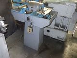 a machine that is sitting in a room next to a wall
