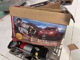 a box that has a toy truck inside of it