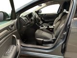 the interior of a car with the door open and the driver ' s seat down