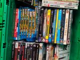 a lot of dvds in a green box