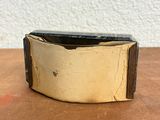 gold and black leather cuff bracelet with a metal clasp