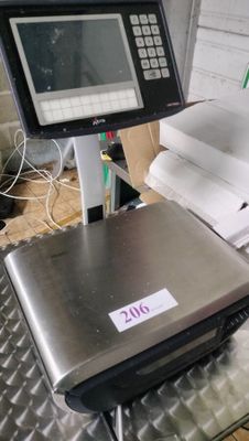 an image of a scale with a laptop on it
