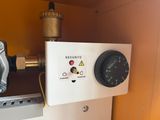 a close up of a control panel in a room