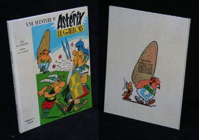 two books that are on a black table