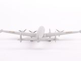 a small model of a plane on a white surface
