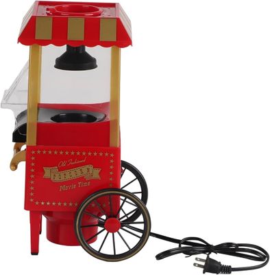une machine à pop-corn rouge surmontée d'un auvent rouge