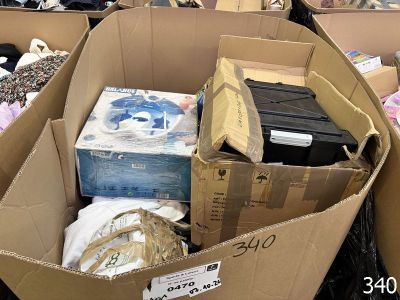 a cardboard box filled with many different types of items