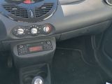 a car dashboard with a steering wheel and dashboard controls