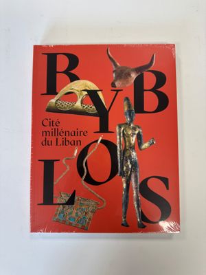 a red book with a picture of a bull on it