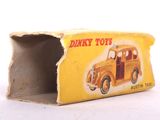 a small yellow box with a picture of a car inside of it