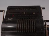 an old type of cash register with keys and numbers on it