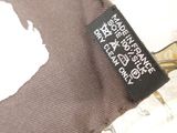 a label on a t - shirt with a picture of a cat