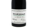 a bottle of wine that is sitting on a table