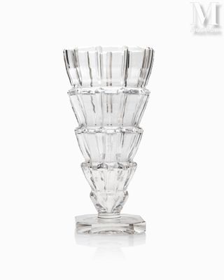 a glass vase that is sitting on a table