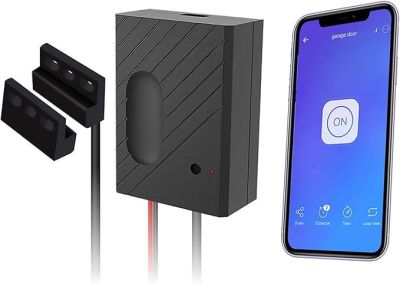 a close up of a cell phone next to a charger and a charger