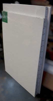 a stack of papers sitting on top of a table