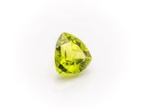 a green peridot stone on a white background