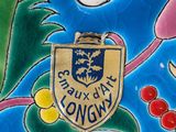 a close up of a plate with flowers and a coat of arms on it