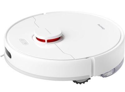 gros plan d'un aspirateur robot sur une surface blanche