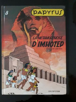 la couverture d'une bande dessinée représentant un homme et deux enfants