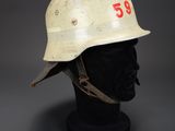a close up of a helmet on a mannequin head