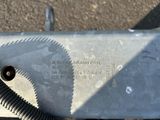 a close up of a piece of metal on the ground