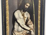 painting of a man with a sword in a frame on a wall
