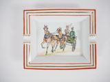 a picture of a plate with a picture of a horse drawn carriage